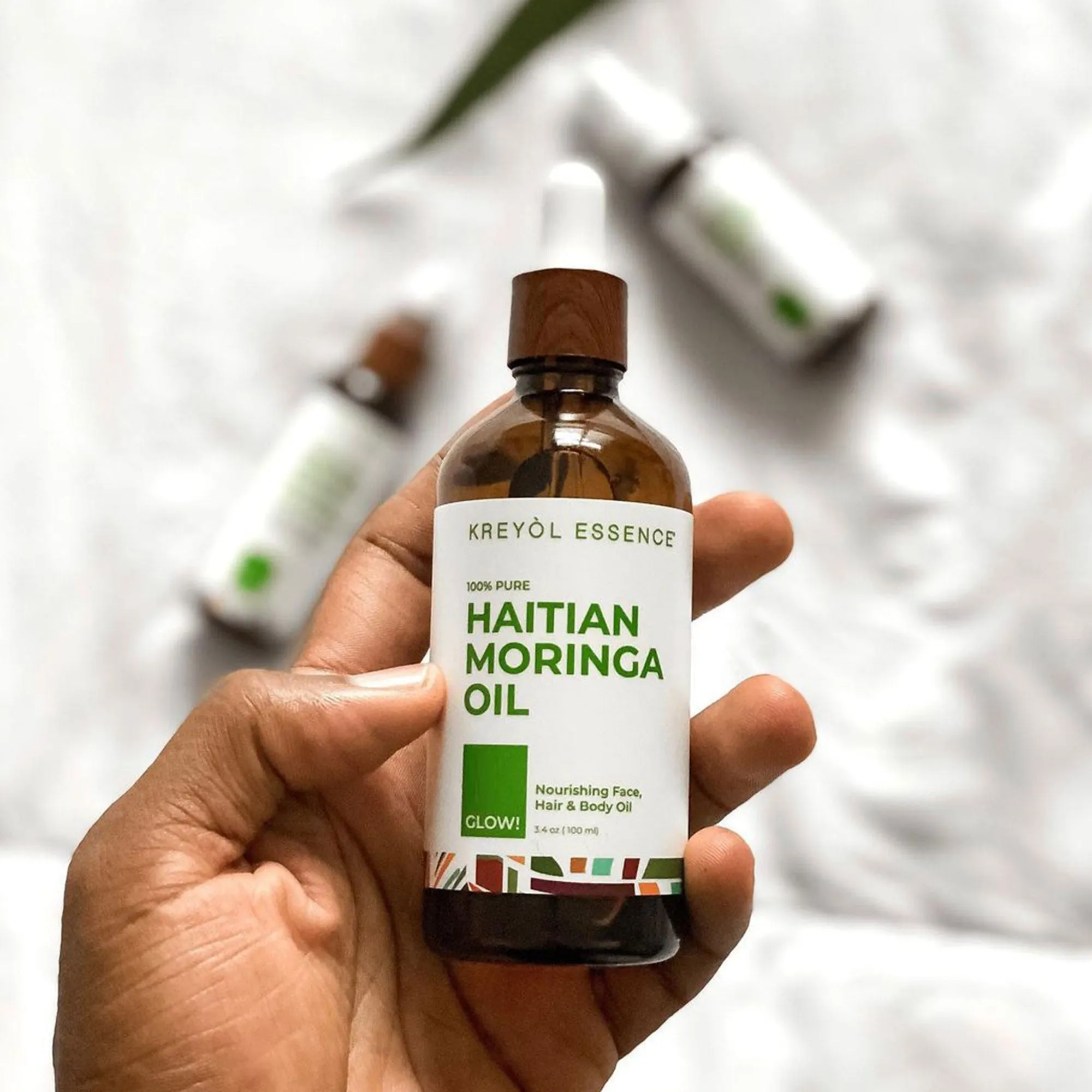 Buy Haitian Moringa Oil: Nourishing Face & Body Oil (3.4oz), get one FREE